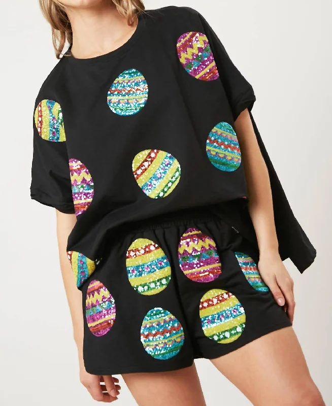 Fresh Styles, Fresh Deals Sequin Easter Egg Top In Black